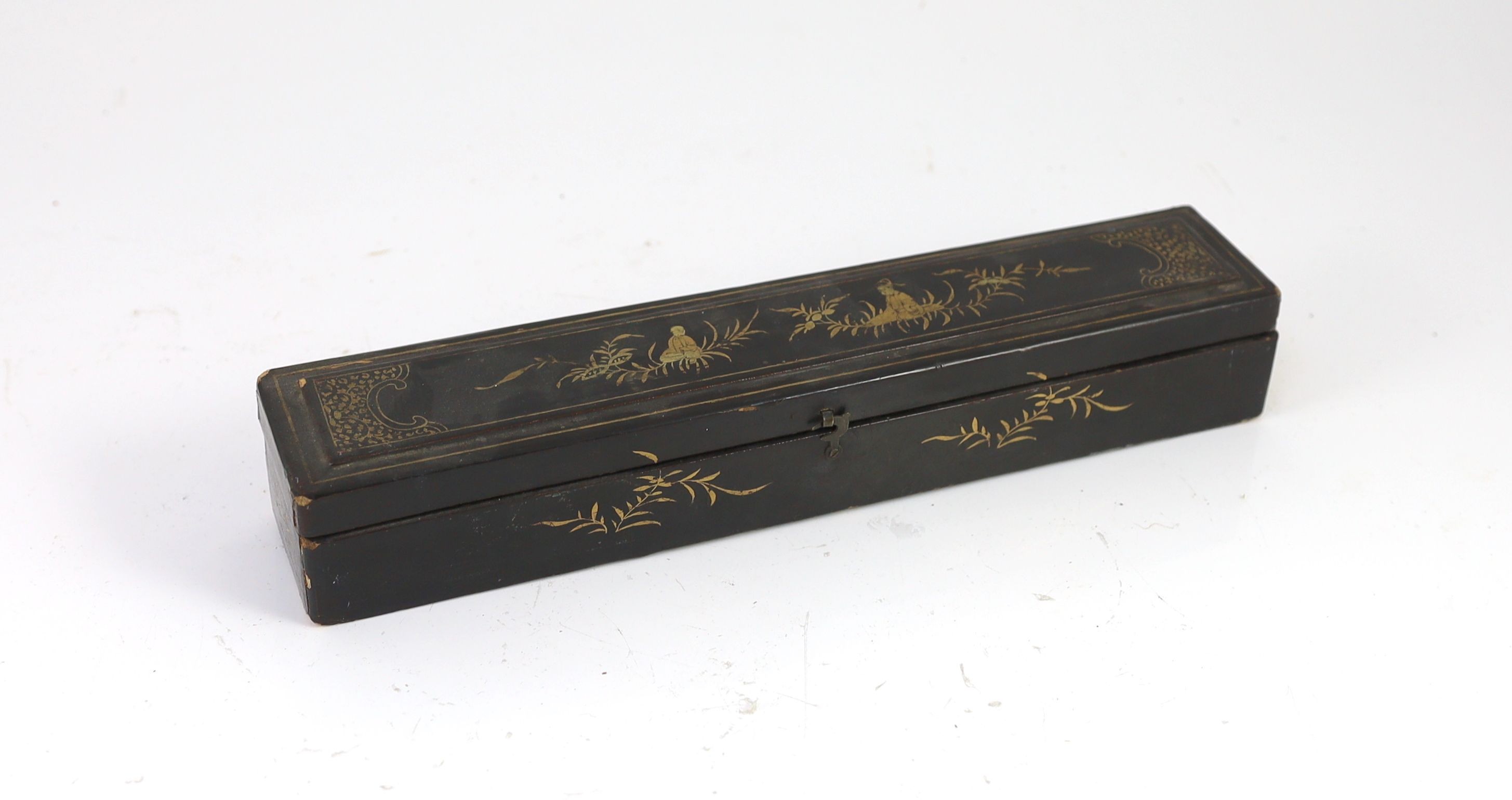 A Chinese lacquer cased sandalwood and lacquer fan, 19th century, 32cm, slight damage